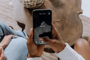 https://www.pexels.com/photo/person-holding-black-android-smartphone-5081930/