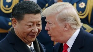 Foto: Xi Jinping dan Donald Trump. (AP Photo/Andy Wong, File)